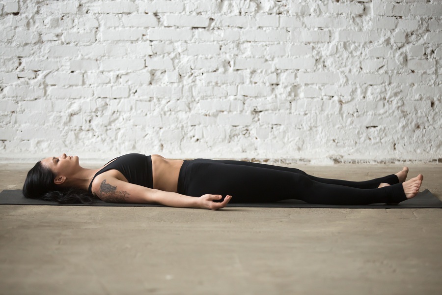 Always end your yoga workout with this restorative pose to relax your muscles and calm down your body.